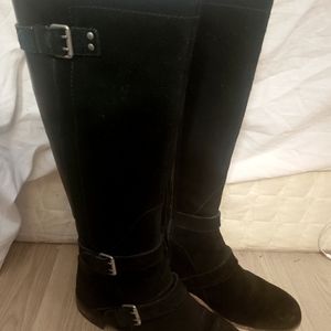Uggs size 7 Genuine Black swade/leather boots